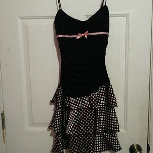 A black poka dot dress